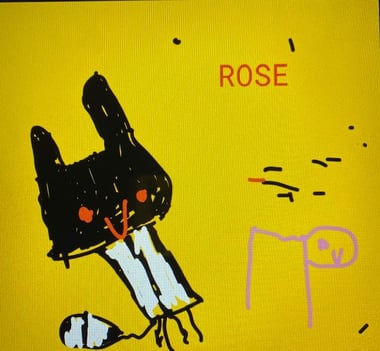 A cat drawn by a child on a Chromebook